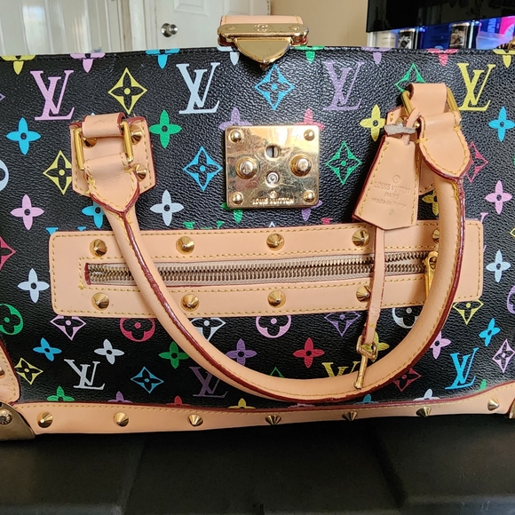 Louis Vouitton - Picture 1 of 4